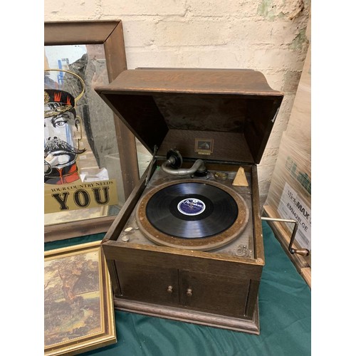 54 - 1920/30'S WIND UP GRAMOPHONE MADE BY H.M.V. IN WORKING ORDER NICELY PRESENTED IN WOODEN CABINET.