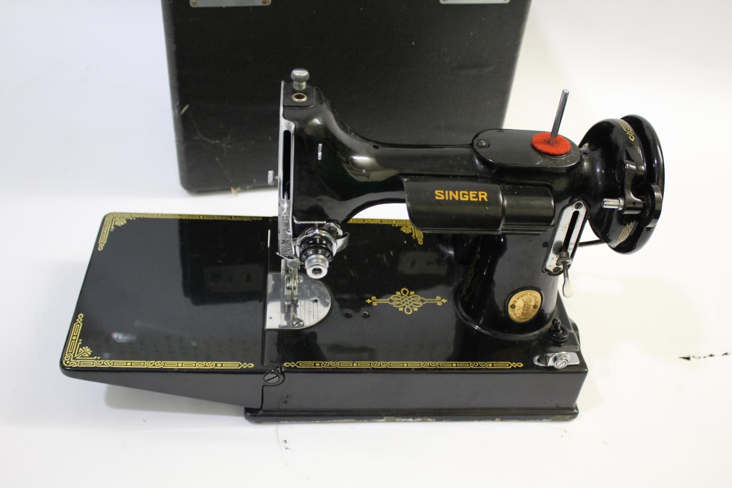 SINGER SEWING MACHINE 221K a folding portable Singer 221K sewing machine, in its case and with it'