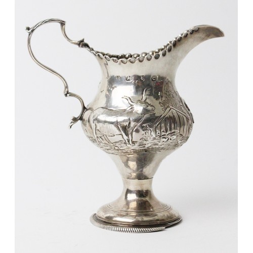 A Georgian silver cream jug by Hester Bateman, London 1780, of baluster ...