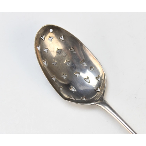 61 - A silver mote spoon, 18th century, of typical form, with heart and trefoil pierced bowl, engraved ve... 