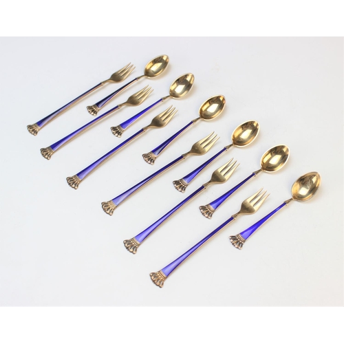 8 - A twelve piece Danish silver gilt and enamel cutlery set by Egon Lauridsen, comprising six coffee sp... 