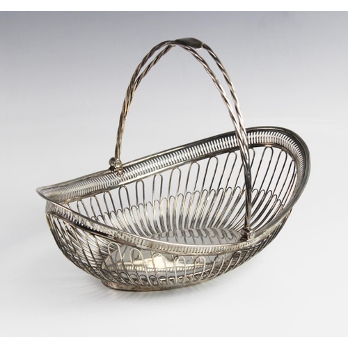 3 - A George III silver bread basket by Samuel Roberts, George Cadman & Co, Sheffield 1796, the navette ... 