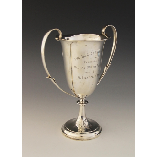2 - A George V silver twin-handled trophy cup, Elkington & Co, Birmingham 1930, of tapering form on knop... 