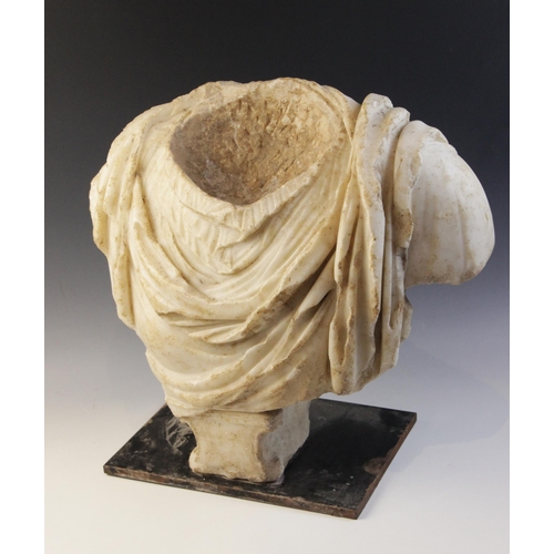 A Roman marble bust with the folds of the tunic deeply carve... Barnebys