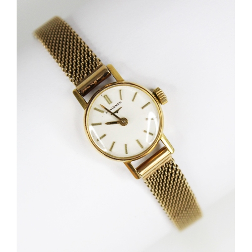48 - A ladies vintage 18ct gold Longines wristwatch, the circular white dial with baton markers, plain po... 