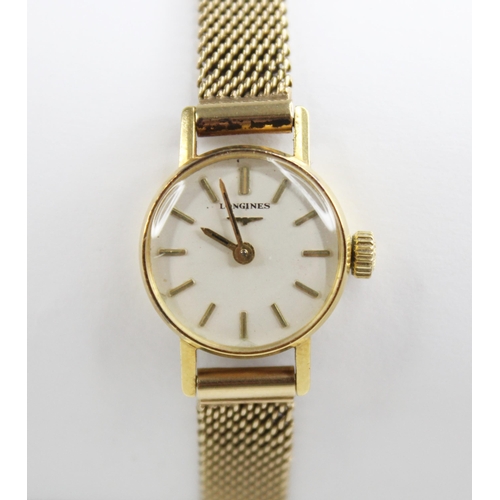 48 - A ladies vintage 18ct gold Longines wristwatch, the circular white dial with baton markers, plain po... 