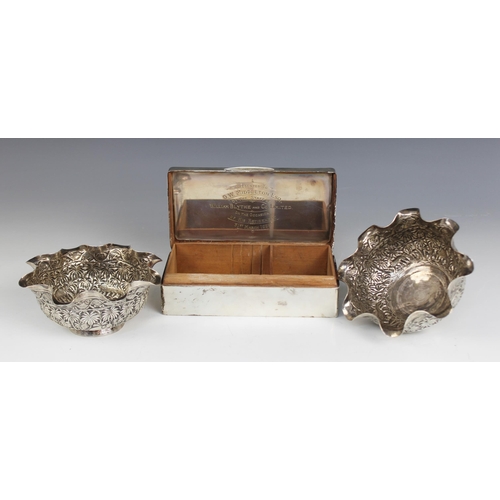 9 - A George V silver mounted cigarette box, London 1920 (maker's marks worn), of plain polished rectang... 