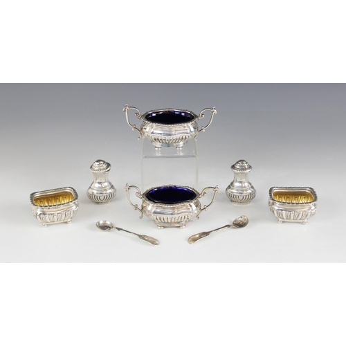 35 - A pair of late Victorian silver salts, Marples & Co, London 1899, each of oval form with canted corn... 