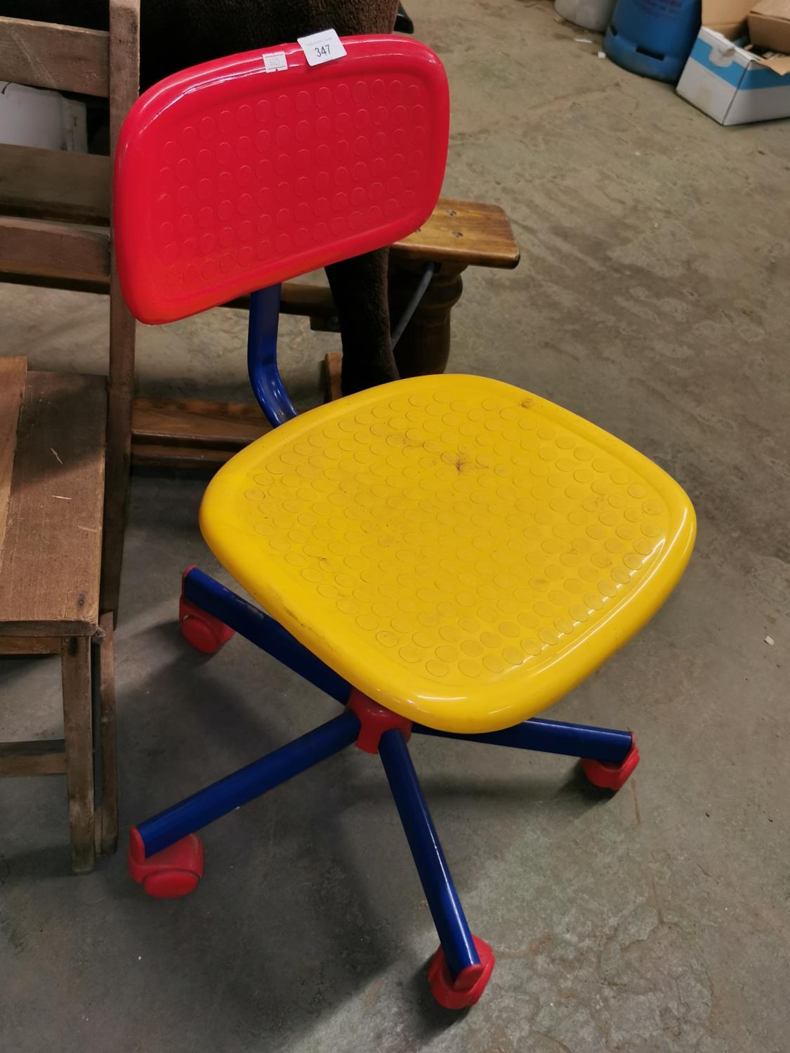 childs ikea red yellow and blue plastic swivel chair