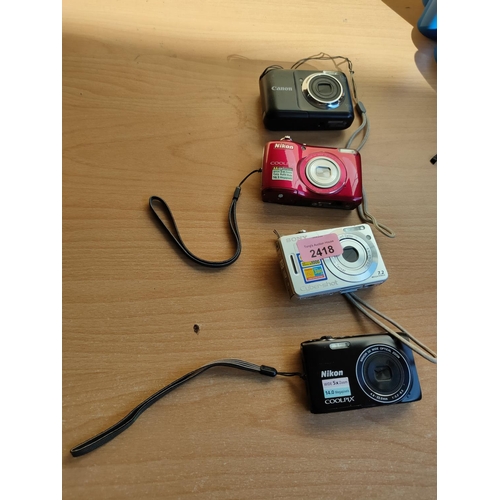 Four small digital cameras