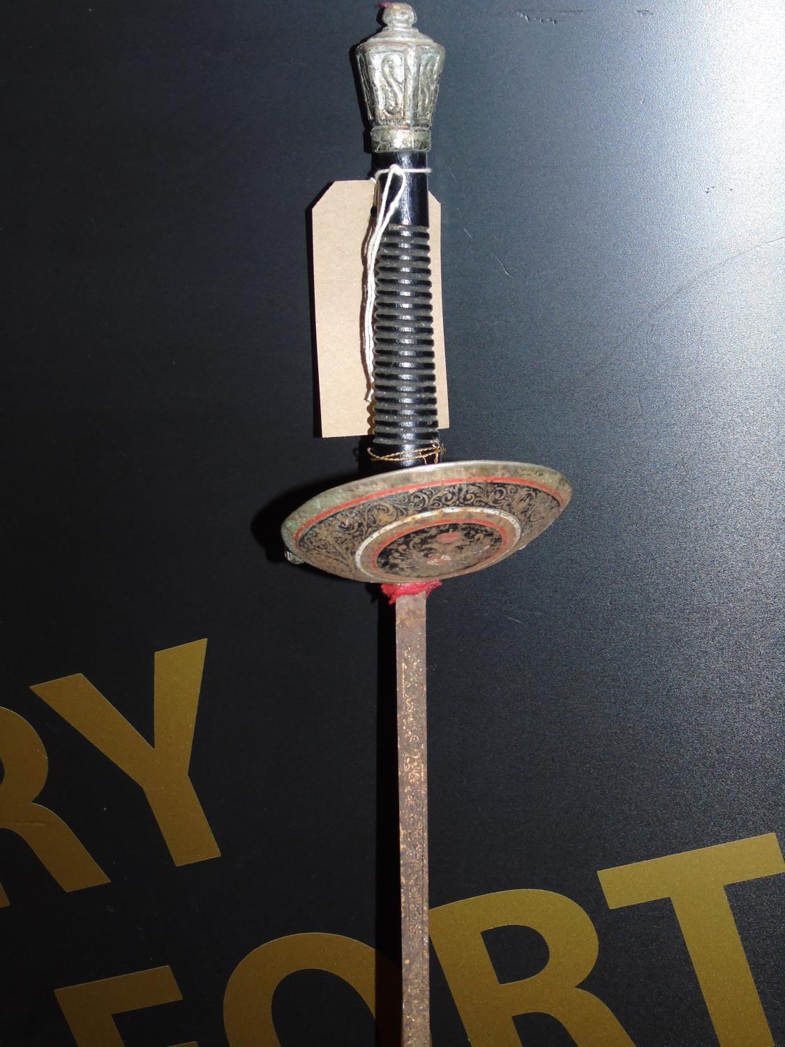 A vintage fencing foil
