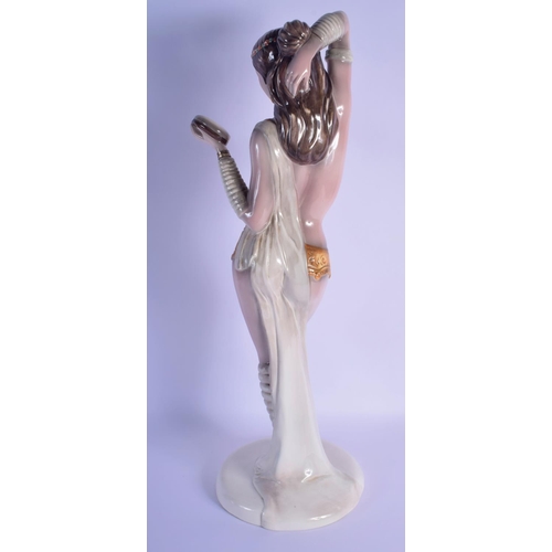 12 - A VERY LARGE 1950S ITALIAN CERAMIC FIGURE OF A STANDING NUDE FEMALE DANCER in the manner of Lenci, m... 
