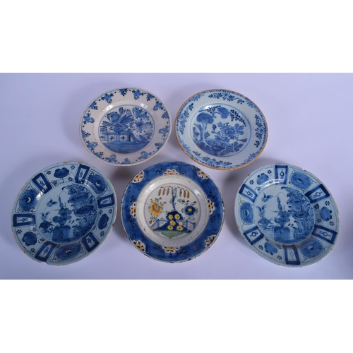 28 - FIVE 18TH CENTURY DELFT BLUE AND WHITE PLATES in various designs. 22 cm diameter. (5)