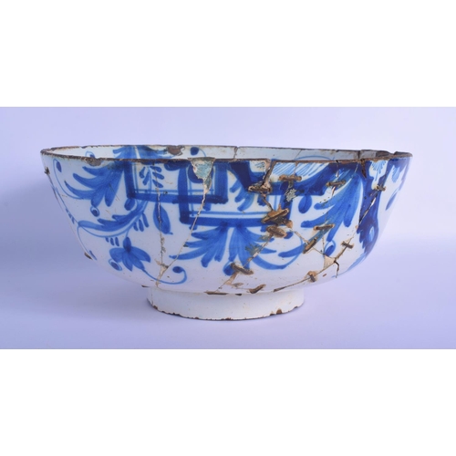 29 - A LARGE 18TH CENTURY DELFT BLUE AND WHITE BOWL together with a similar shallow dish. Largest 22 cm x... 