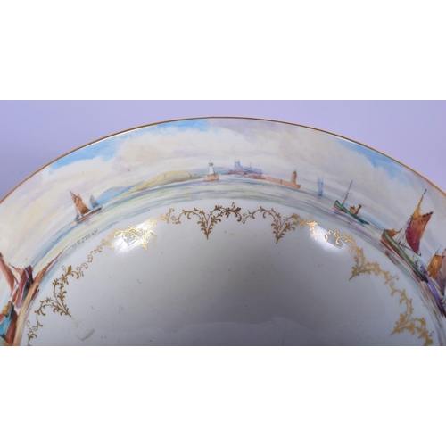 3 - A RARE ROYAL CROWN DERBY PORCELAIN BOWL by W E J Dean, painted with boats at sea. 18 cm wide.