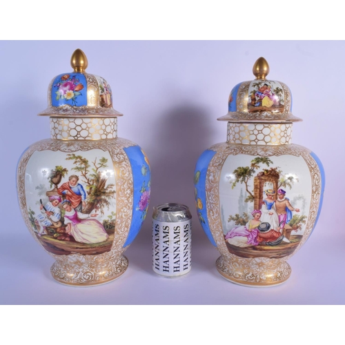 43 - A LARGE PAIR OF 19TH CENTURY GERMAN AUGUSTUS REX VASES AND COVERS painted with lovers. 37 cm x 18 cm... 