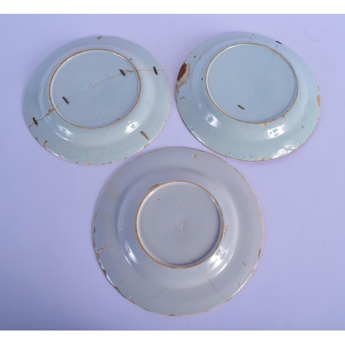 60 - THREE 18TH CENTURY DELFT BLUE AND WHITE TIN GLAZED PLATES in various designs. 20 cm diameter. (3)
