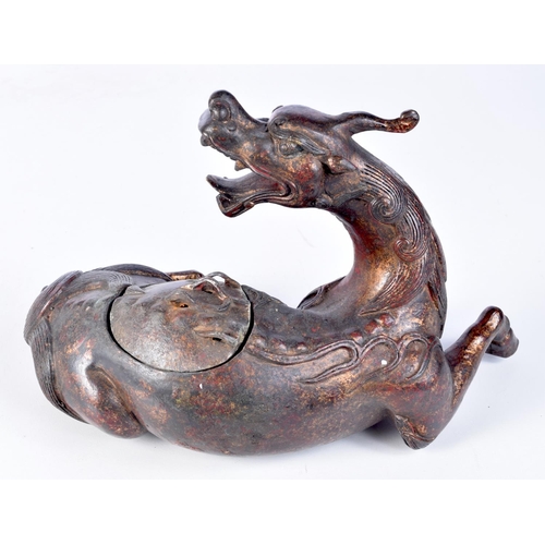 3206 - A Chinese bronze incense burner in a form of a beast. 17 x 25cm.
