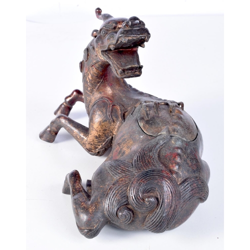 3206 - A Chinese bronze incense burner in a form of a beast. 17 x 25cm.