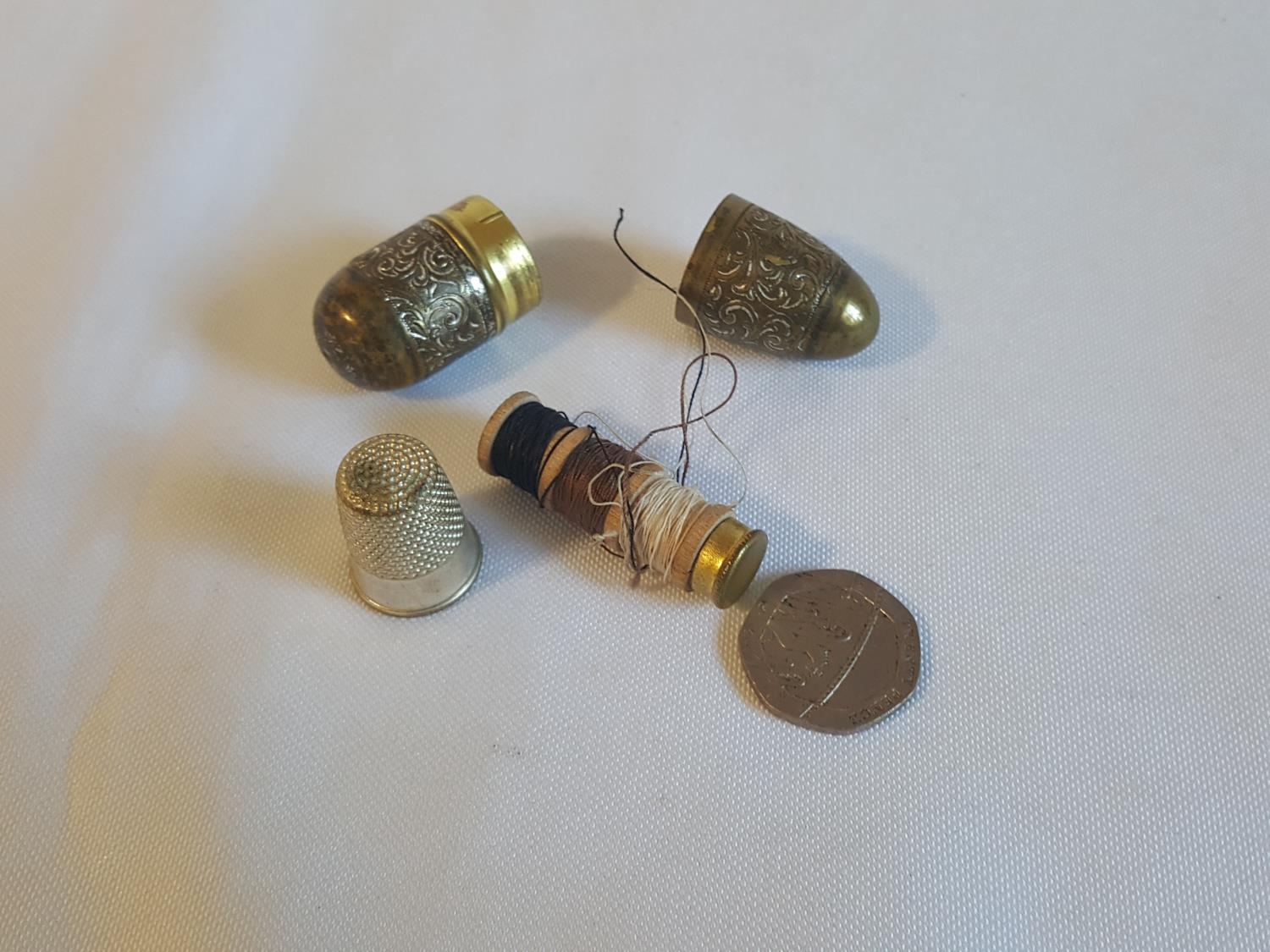 miniature brass sewing kit