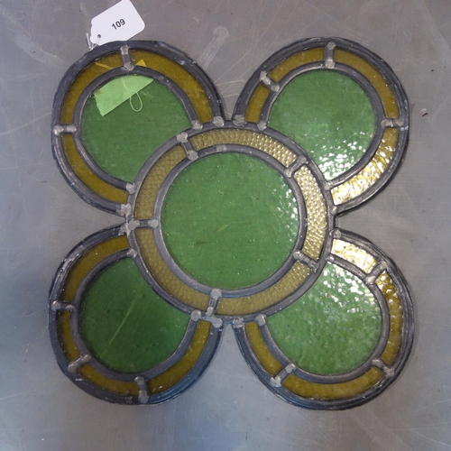 A stained glass panel of quatrefoil form, 45 x 45cm