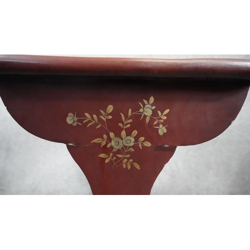 432 - A nest of two red lacquered Chinoiserie decorated occasional tables. H.70 W.49 D.31