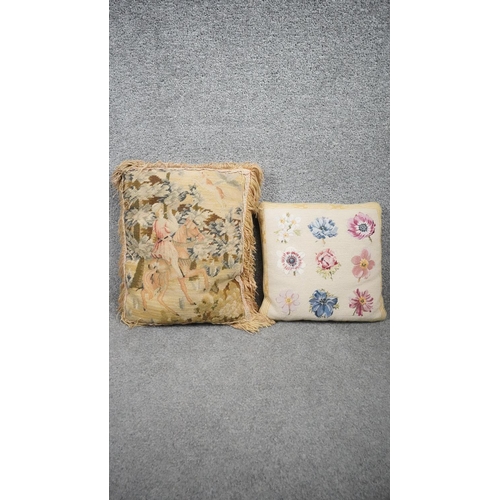 434 - One Aubusson and one needle point cushion. One with a rider on horse back and one with floral design... 