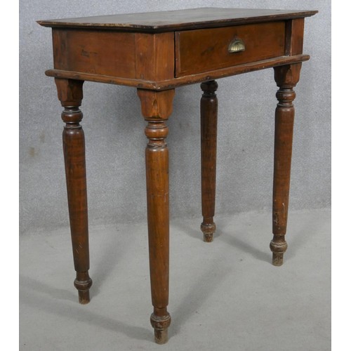 22 - A C.1900 stained pine side table on turned tapering supports. H.95 W.83 D.49cm