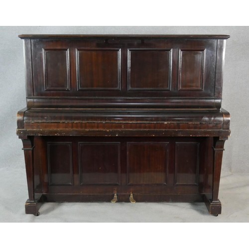 23 - A Boyd of London mahogany cased upright piano with maker's mark to the iron frame. H.131.5 W.148 D.6... 