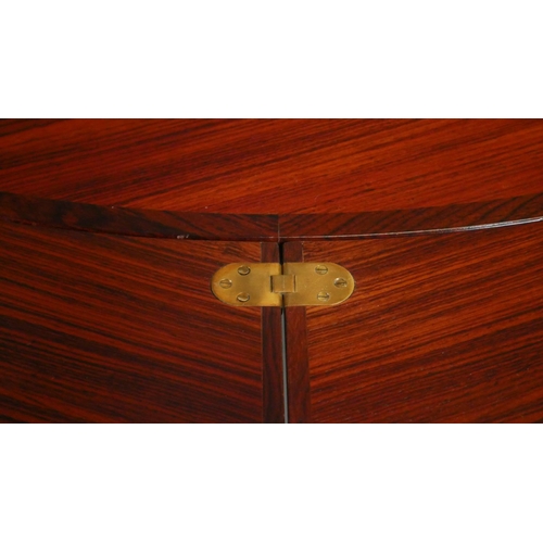 33 - A vintage Dyrland Lotus 'flip flap' table with pull out folding arc extensions. H.72 D.128 D.180cm