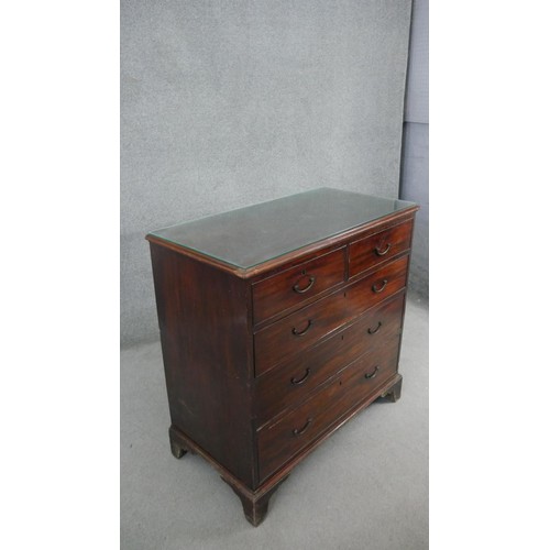 34 - A Georgian mahogany chest of drawers on shaped bracket feet. H.99 W.110 D.52cm