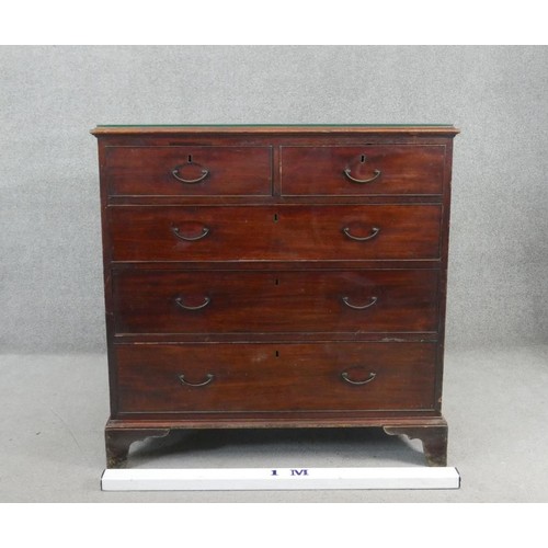 34 - A Georgian mahogany chest of drawers on shaped bracket feet. H.99 W.110 D.52cm