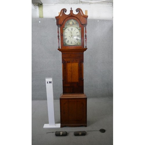 217 - A Georgian figured mahogany longcase clock signed W. Raw Whitby with swan neck pediment, painted arc... 