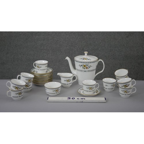 230 - A Minton twelve person part tea service 'Avignon' pattern, comprising eleven cups, twelve saucers, m... 
