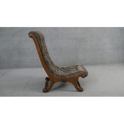 276 - A Victorian mahogany framed nursing chair in deep buttoned velour upholstery.