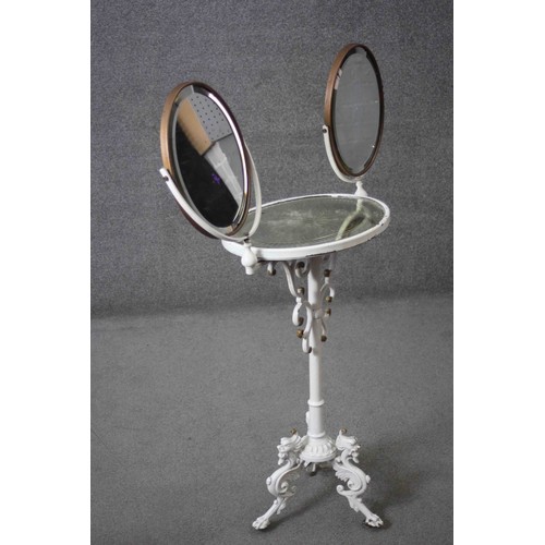 279 - A 19th century wrought iron dressing table with twin bevelled and adjustable vanity mirrors above et... 