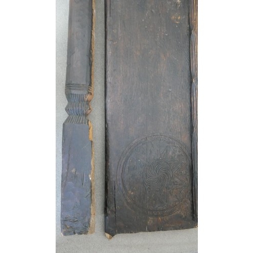 281 - A pair of antique carved doors from the Kafiristan region of Afghanistan with two door posts. 
H.209... 