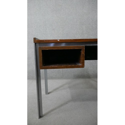 283 - A vintage teak writing table on a metal frame. H.73 W.107 D.53cm