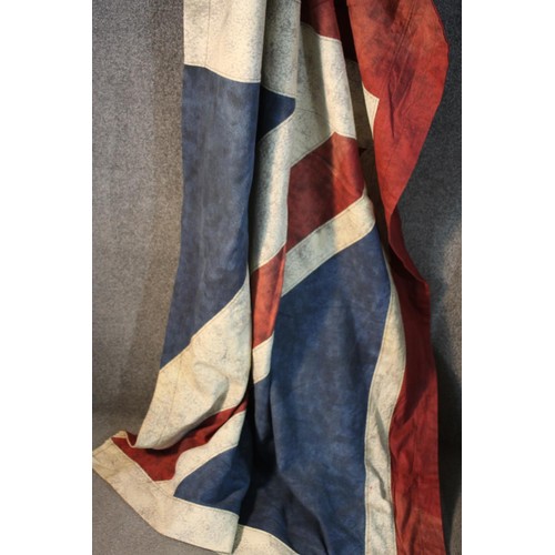 142 - Two halves of a Union Jack, together forming a large wall hanging. H.350 W.130 cm.