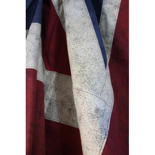 142 - Two halves of a Union Jack, together forming a large wall hanging. H.350 W.130 cm.