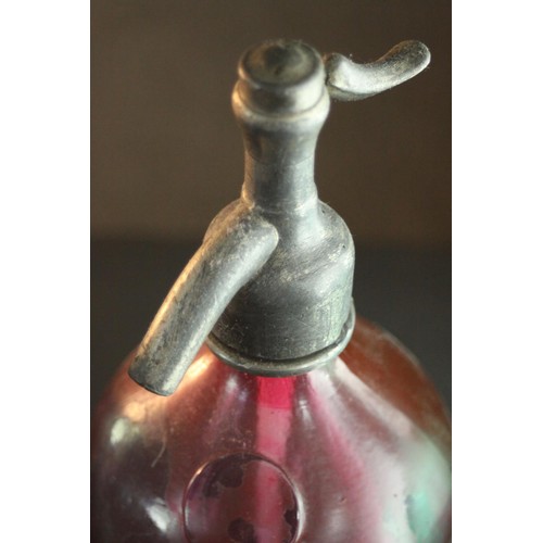 144 - A collection of four vintage Ricardo Zottola soda syphons with chrome spouts. H.30cm.