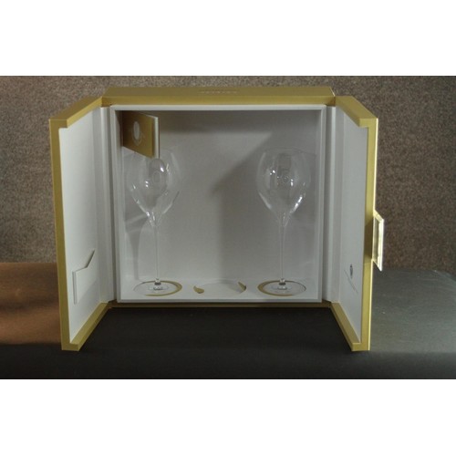 145 - A pair of Louis Roederer champagne glasses in a presentation case. (One glass is missing from the ca... 