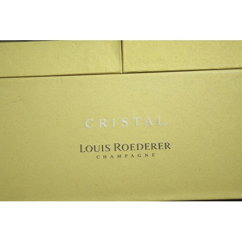 145 - A pair of Louis Roederer champagne glasses in a presentation case. (One glass is missing from the ca... 