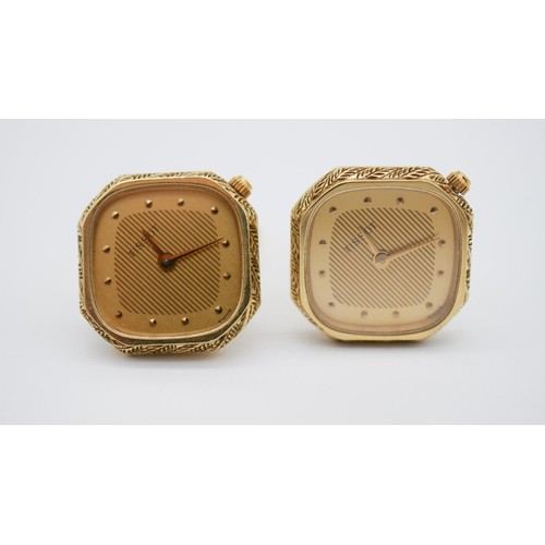 188 - A pair of 14 carat yellow gold Tissot novelty watch cufflinks decorated with a foliate design border... 