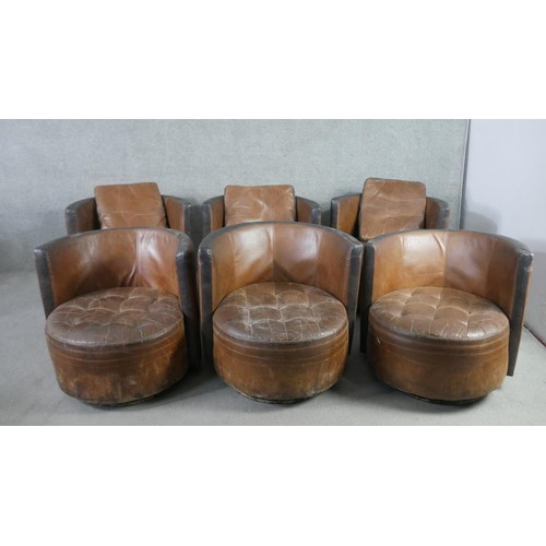 394 - A set of six Art Deco style tub chairs, in brown leather with black leather detail to the arms, curv... 