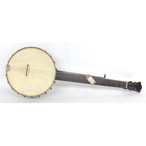 1257 - Lyon & Healy seven string open back banjo, with 11