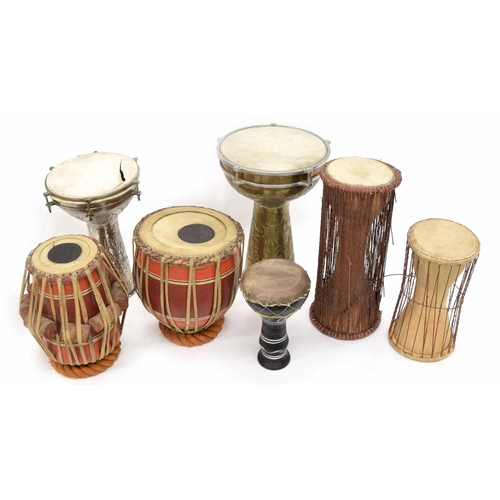 1011 - Collection of ethnic drums; including Darabukka, Tabla and talking drums (7)