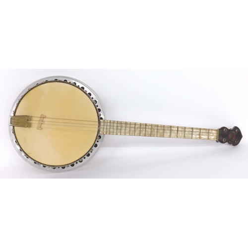 1047 - 1930s Broadcaster nineteen fret tenor resonator banjo, pearloid finish to the rim and fingerboard, 1... 