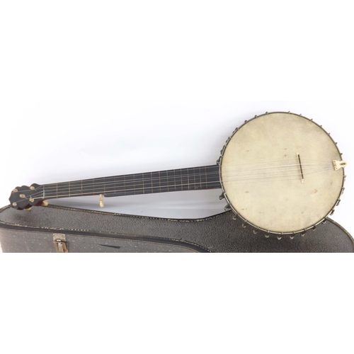 1050 - English six string fretless banjo, circa 1880, with thirty tensioners, original friction pegs, 11.5
