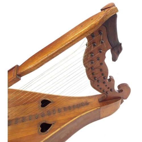 1218 - Interesting twenty-two string knee harp (at fault)